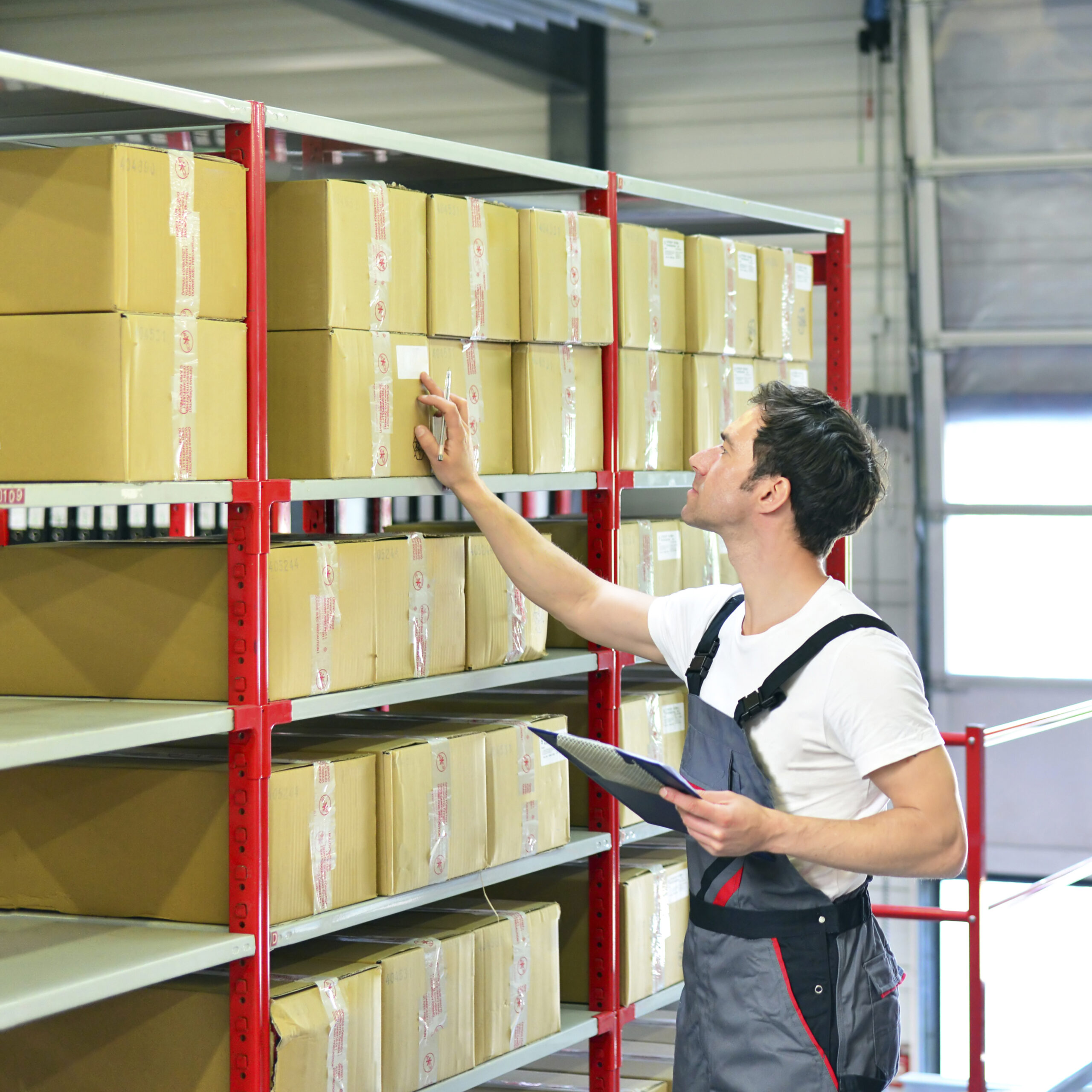 worker-in-warehouse-controlling-goods