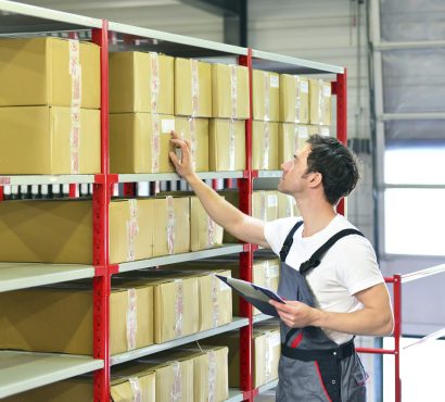 worker-in-warehouse-controlling-goods